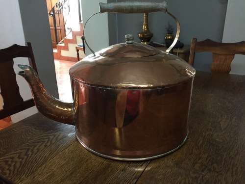 Large solid copper kettle with copper lid and brass and wood handle